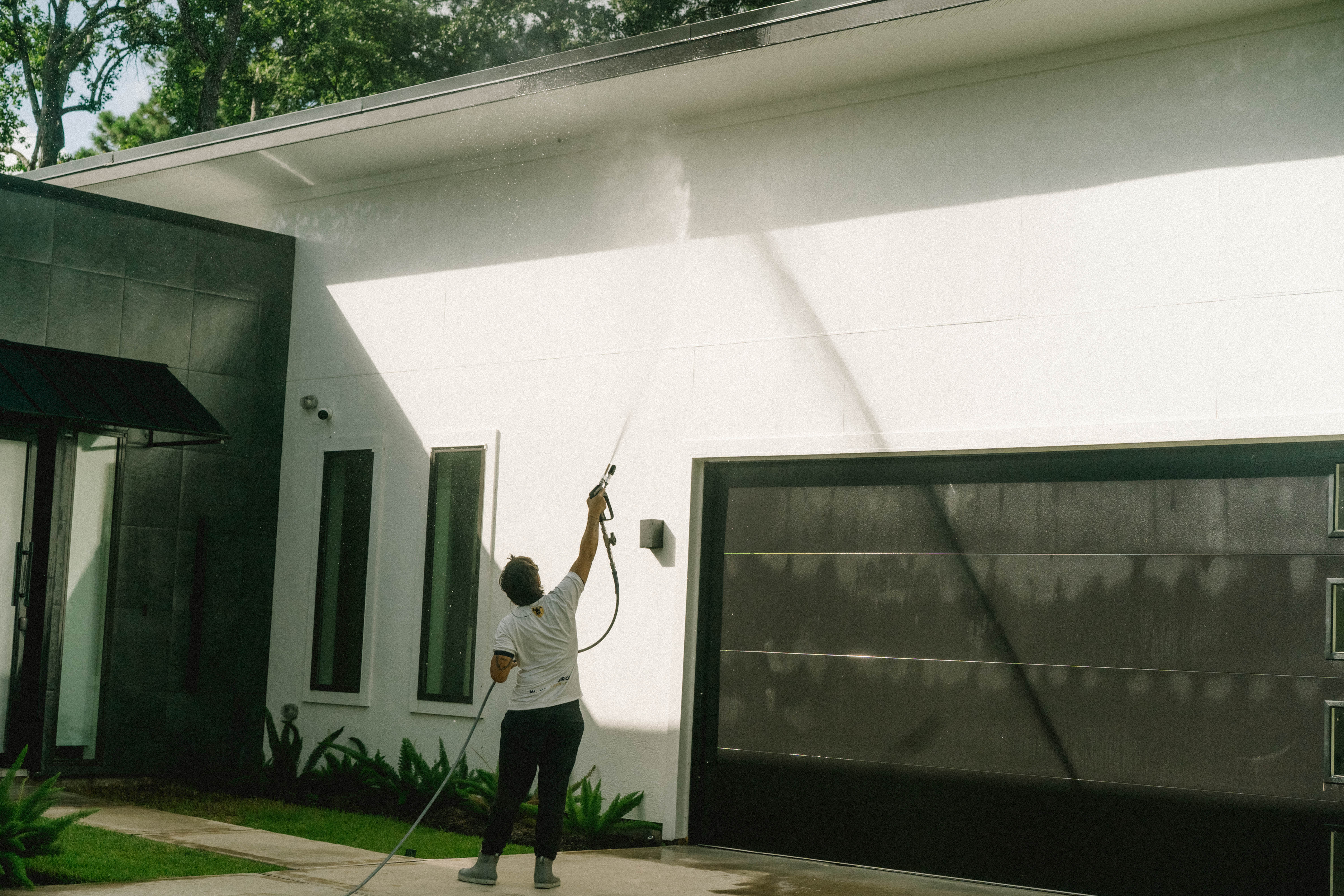 Pressure washing a garage door