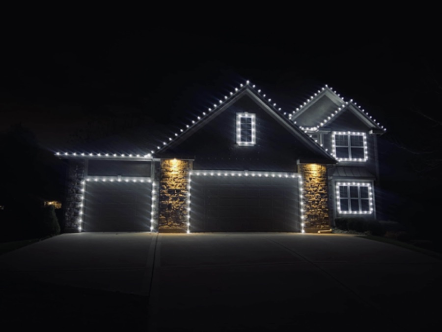 Holiday light installation on a Houston home